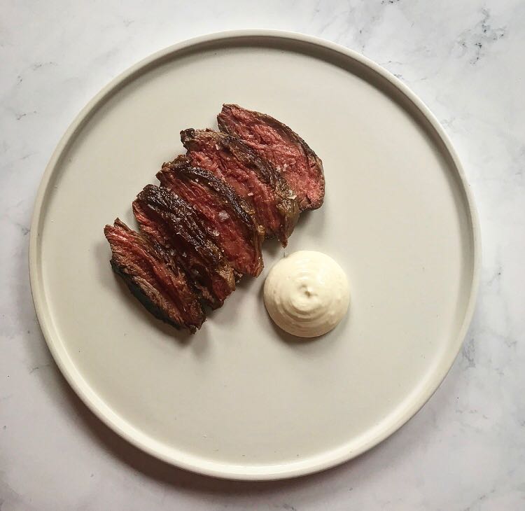 Bavette steak with roast garlic yoghurt.