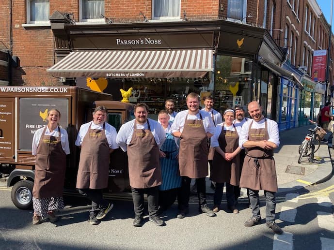 history of butchers shops: staff otuside parson's nose butchers in London